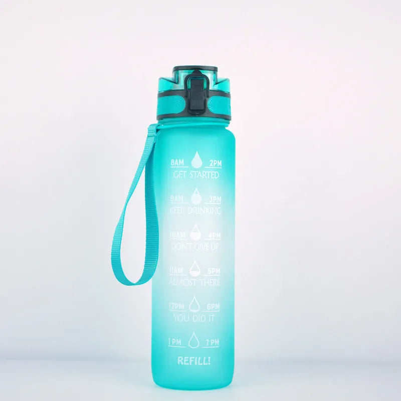 Transparent 1000ml plastic water bottle showing clear Tritan construction with visible liquid