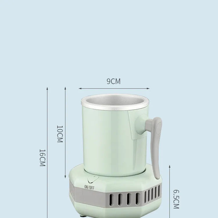 White portable mini cooling cup with aluminium drinking vessel and control base on a desk.