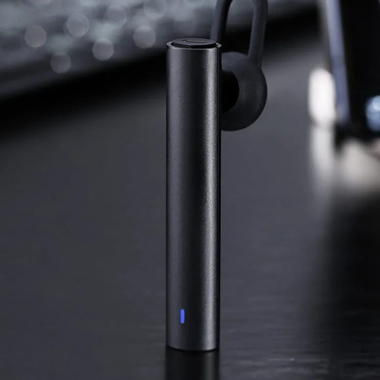 Compact wireless Bluetooth headset measuring 5.6cm with black and white colour options