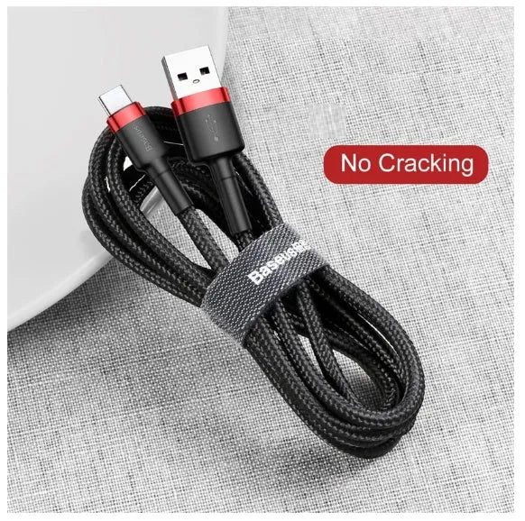 Grey and black woven nylon Android micro USB charging cable shown coiled with connector visible