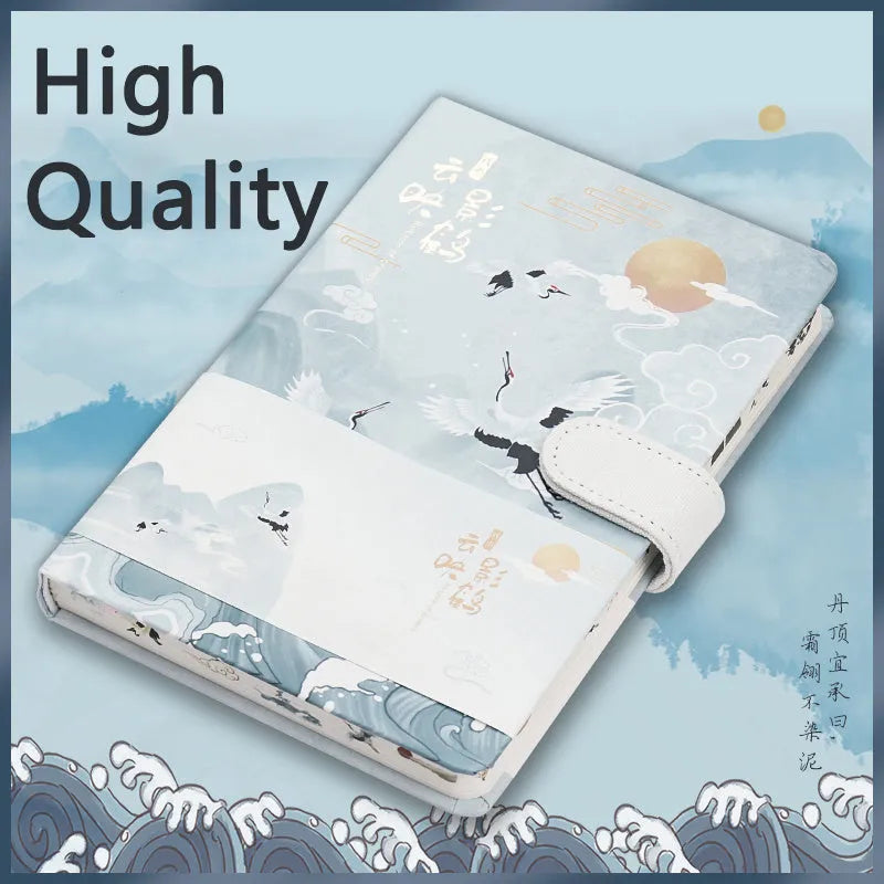 A5 wire-bound retro notebook open showing full-colour vintage illustrations, with a pen.