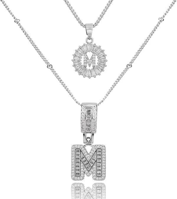 26 English letters copper-plated gold diamond initial pendant necklace with adjustable chain on display