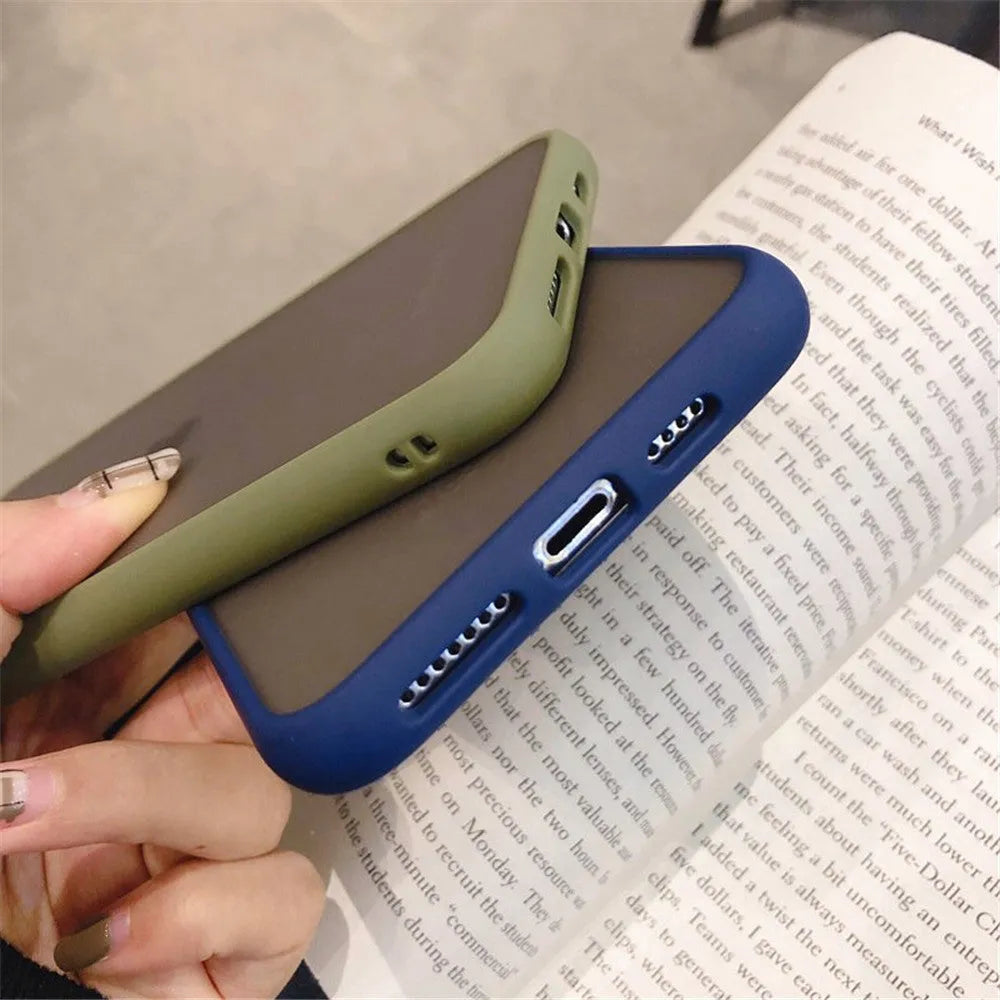 Transparent solid colour silicone shockproof protective case for iPhone on a dark background.