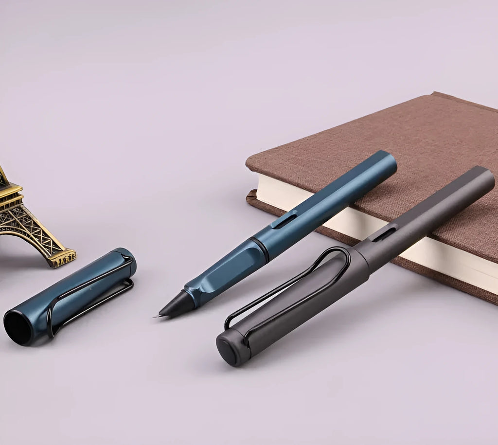 Black and blue frosted ink bag fountain pens with 0.38mm and 0.5mm nib options on a notepad.