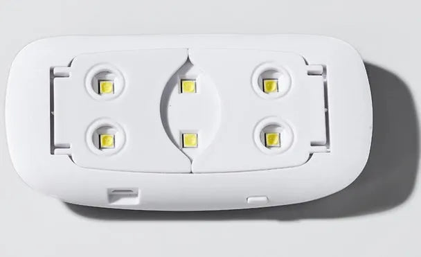 Mini mouse-shaped LED phototherapy machine for nail curing with 6 dual light source lamp beads, available in pink and white, 9W power