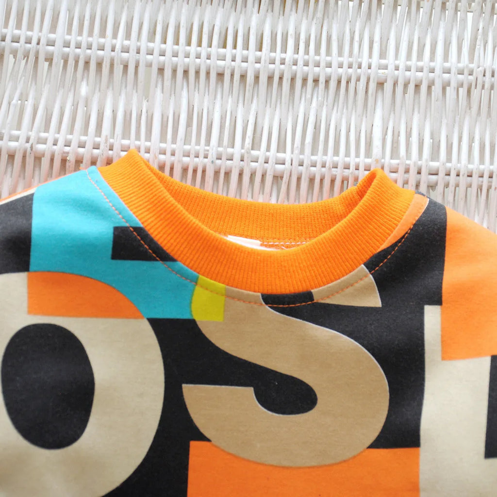 Children's cotton cartoon two-piece suit with pullover sweater and trousers in green and orange