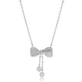 S925 sterling silver bow necklace on collarbone, showing O-ring chain and detailed bow pendant