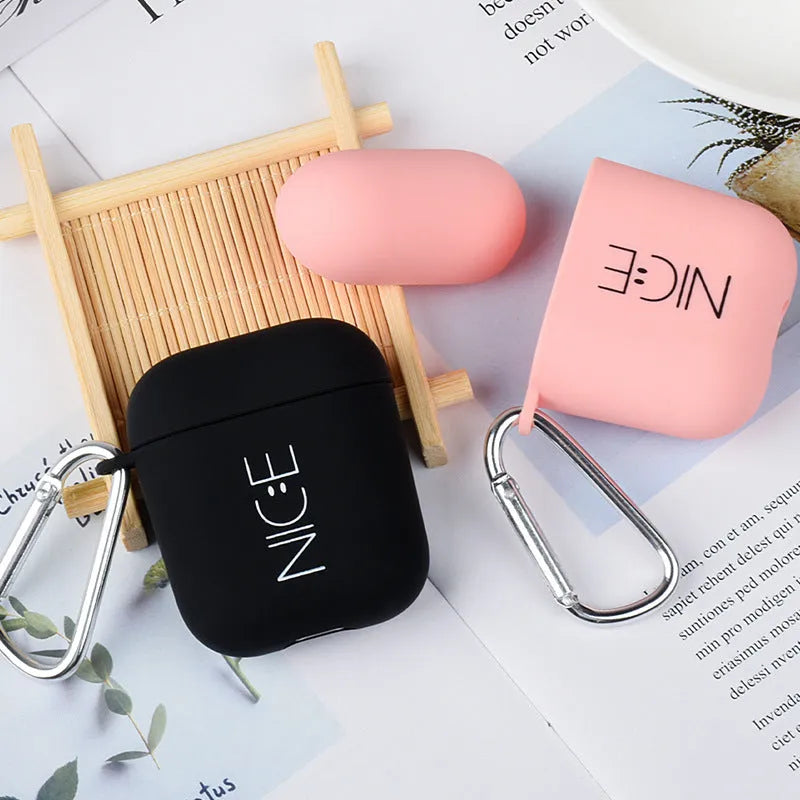 PC AirPods cover with decorative flower design on black background