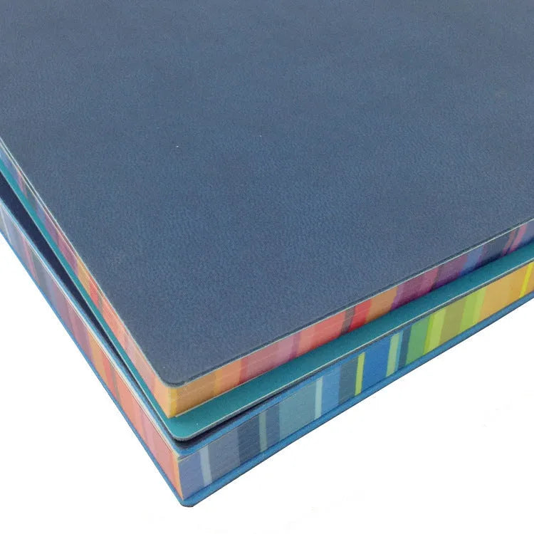 Rainbow side A5 notebook with PU leather back cover and 100g Daolin paper, black colour option, on a flat surface