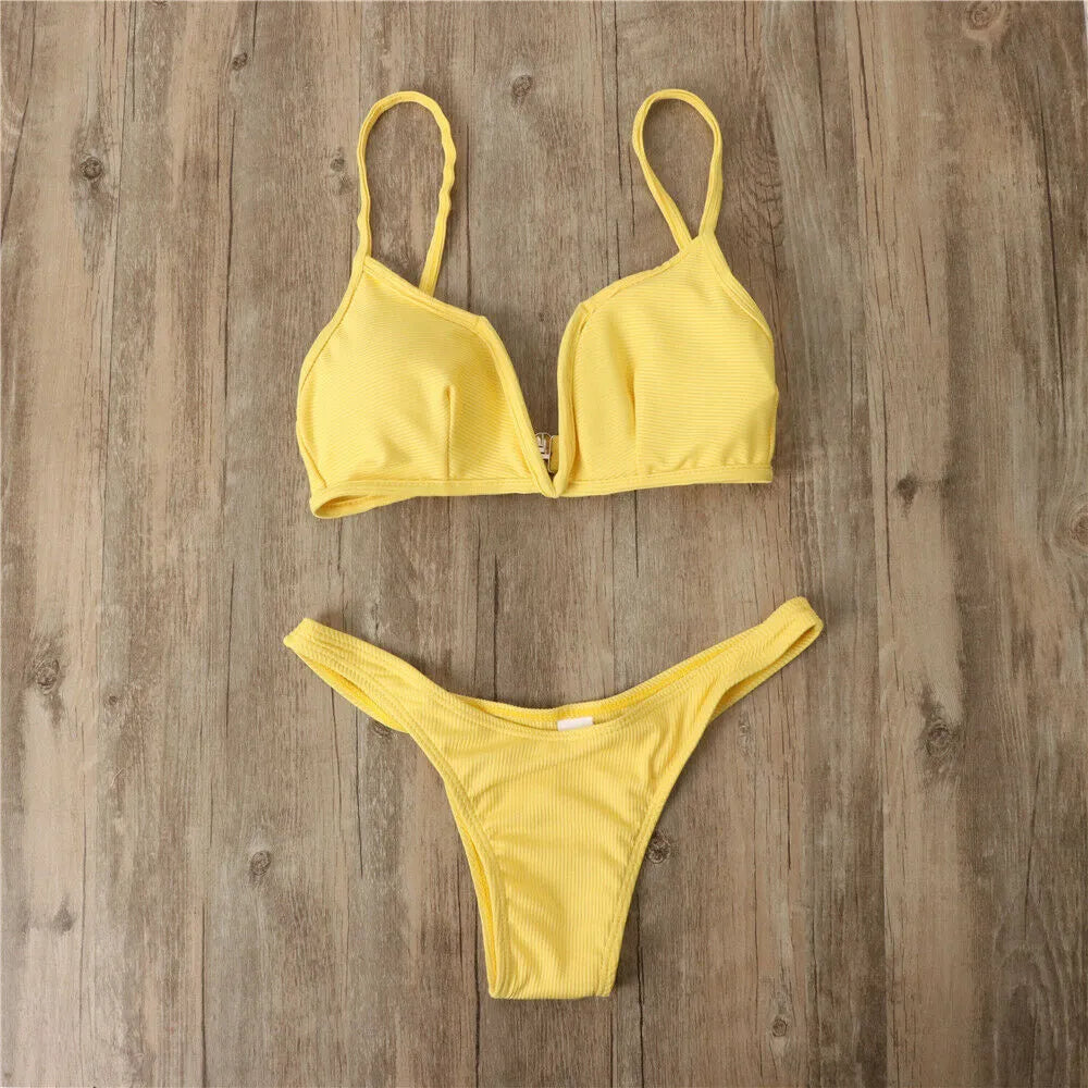 Sexy solid colour backless bikini swimsuit for women in high-elasticity nylon with chest pad, shown in pink