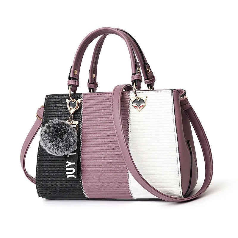 Women handbag made of PU leather with patchwork design and hairball ornaments in grey, pink, purple, and red colour options