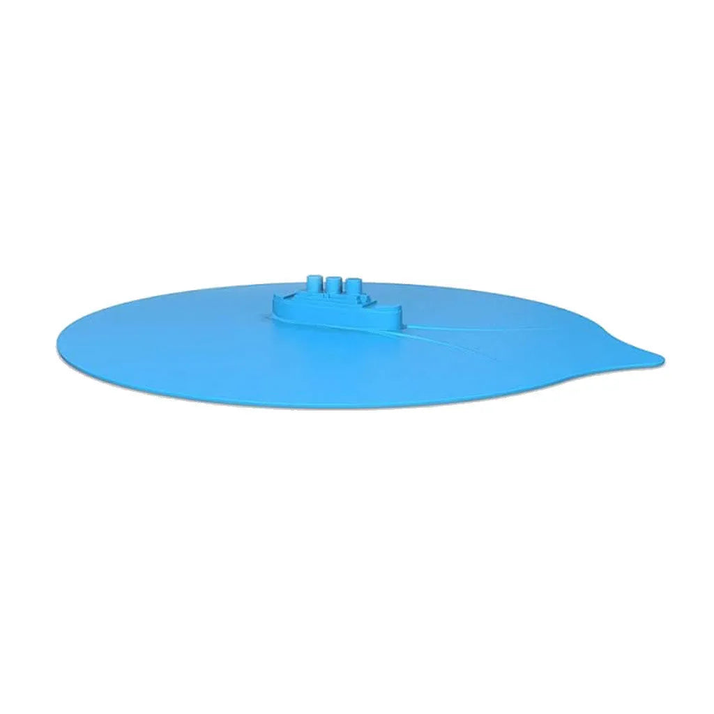 Silicone steamer lid anti-skid and shatter-proof in green on a pot