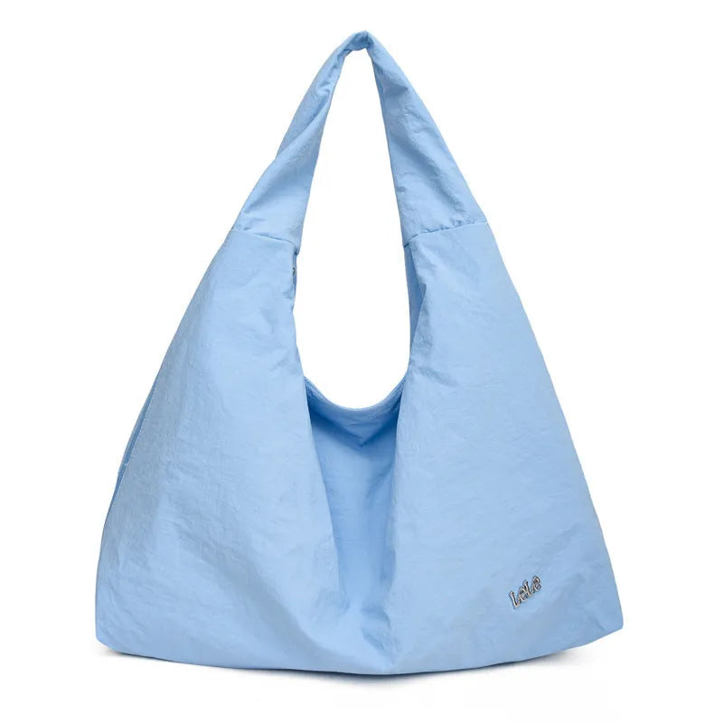 Soft nylon women's underarm bag in heart shape design showing large capacity