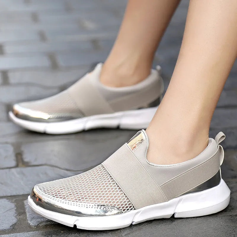 Women's low-top casual sneakers in blue, featuring a mesh upper and a lightweight design.