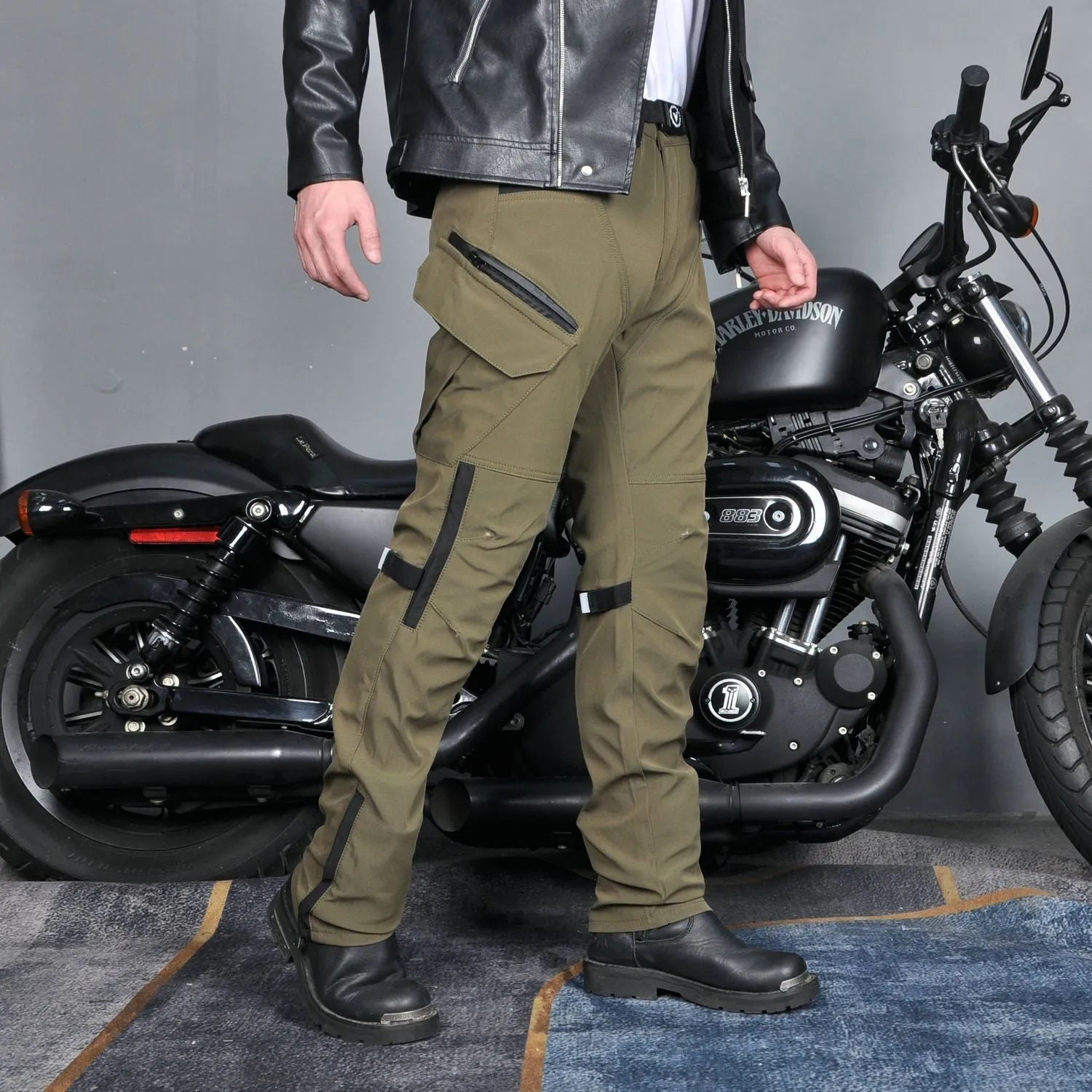 Motorcycle waterproof windproof cycling pants in black and green colours with protective gear and belt