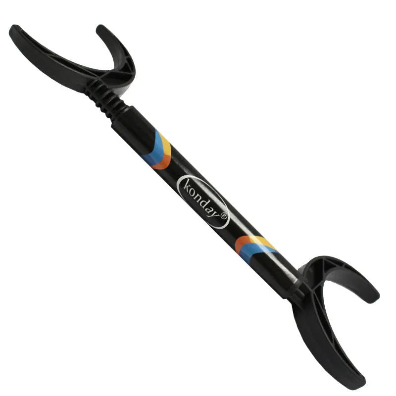 Portable black plastic wedge simulator for golf horn cutting drills on a flat surface