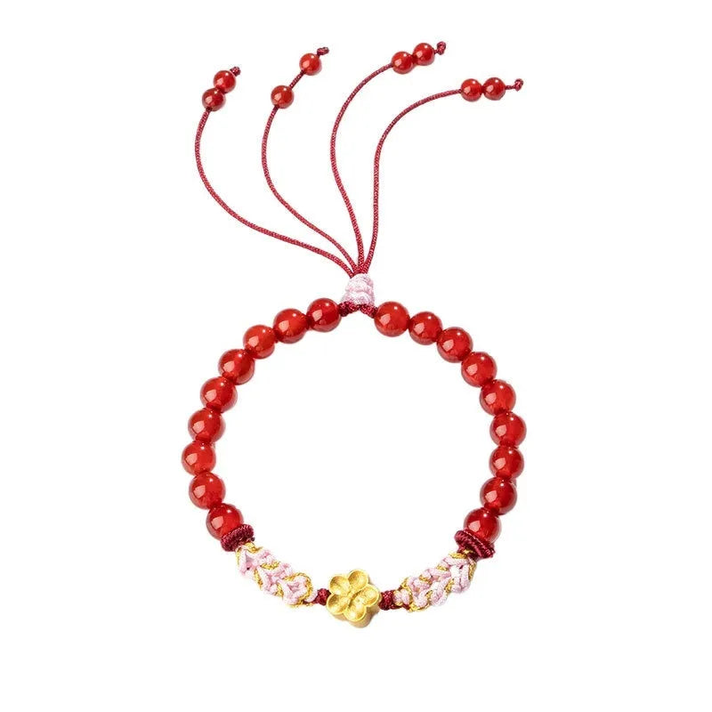 Hand-woven red rope bracelet with diamond crystal and peach blossom design