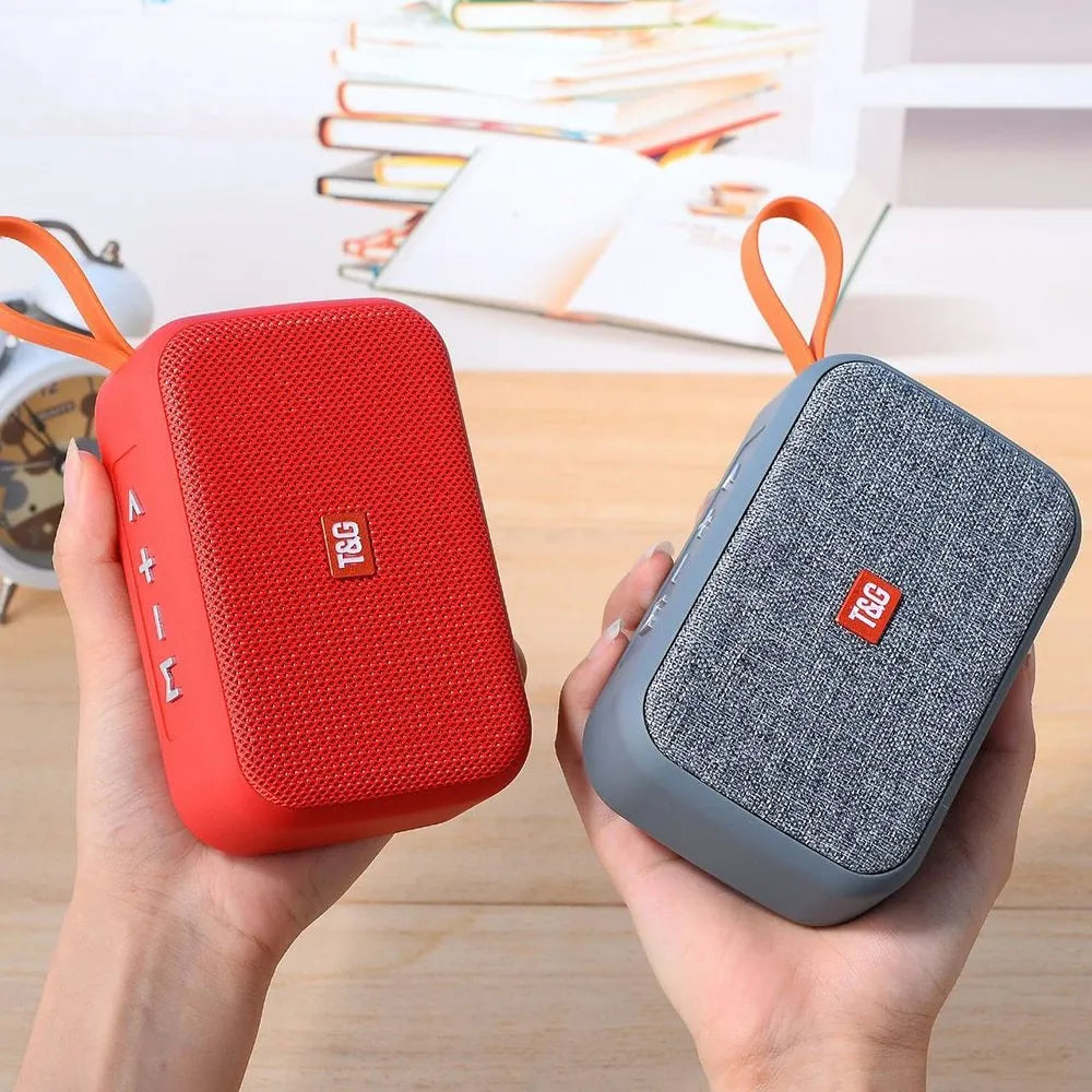 Compact sports Bluetooth speaker in black with radio, USB port, and key controls