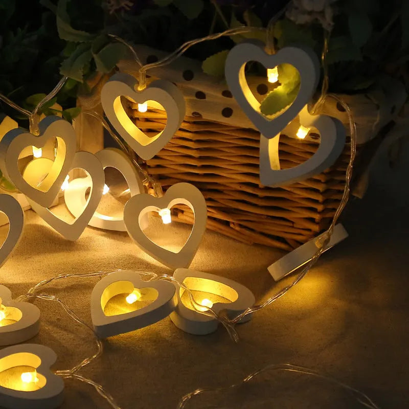 Wooden love lantern string with warm white LEDs on a USB battery cable