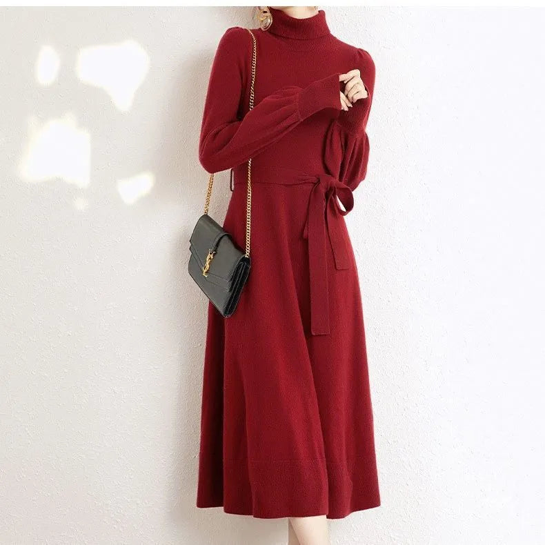 Rose red loose turtleneck knit dress with long sleeves and an elastic waist.
