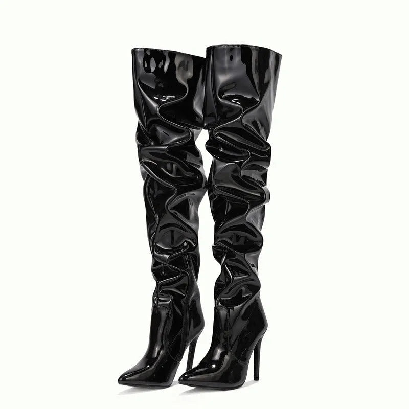 Women's knee high super high heel boots with side zipper, pointy toe, and leather stitching detail in solid colour