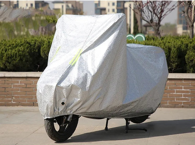 Motorcycle cover in nylon cloth, size M, shown in blue colour on a motorcycle