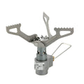 Compact silver portable camping stove with a one-piece burner, using a small green propane gas canister.