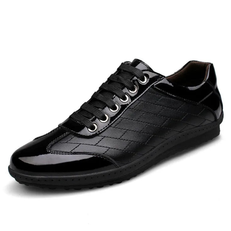 Genuine leather casual men's shoes in black with lace-up closure on a plain background