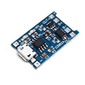 Small blue PCB for lithium battery charging and protection, showing solder pads for input, battery, and output.