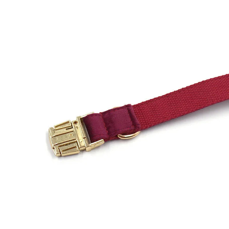 Burgundy velvet pet collar with bow tie and gold engraved clasp, available in sizes XS to XL