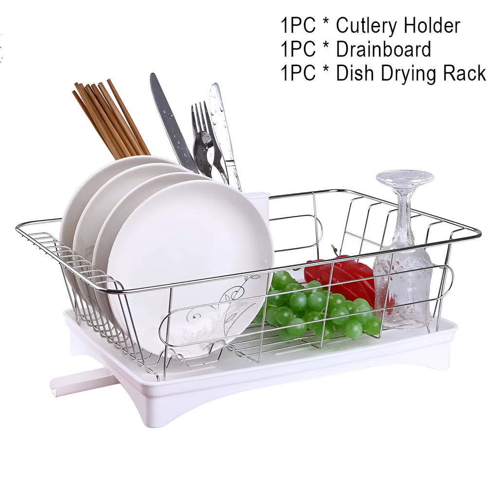 Black stainless steel dish drying rack with cutlery holder and drainboard on a kitchen counter.