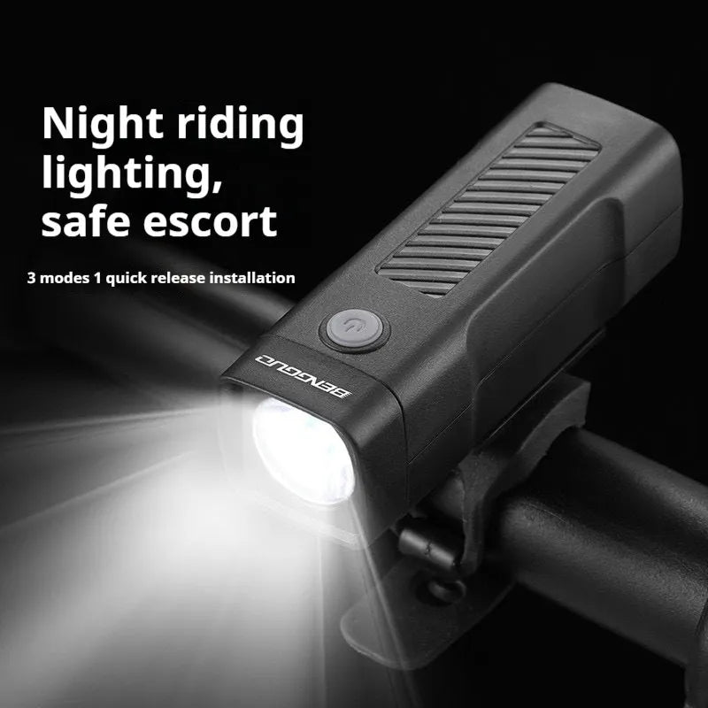 USB rechargeable bicycle headlight with LED lamp and quick release strap bracket on handlebars.