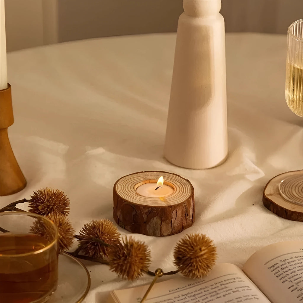 Simple modern pastoral wood candle holder with 4 candles on a table for holiday decoration