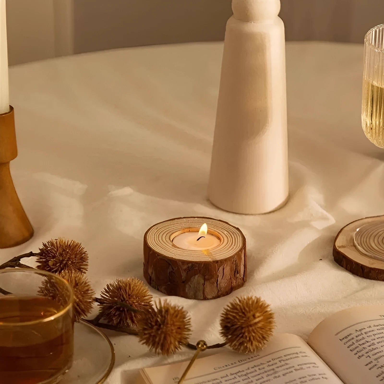 Simple modern pastoral wood candle holder with 4 candles on a table for holiday decoration