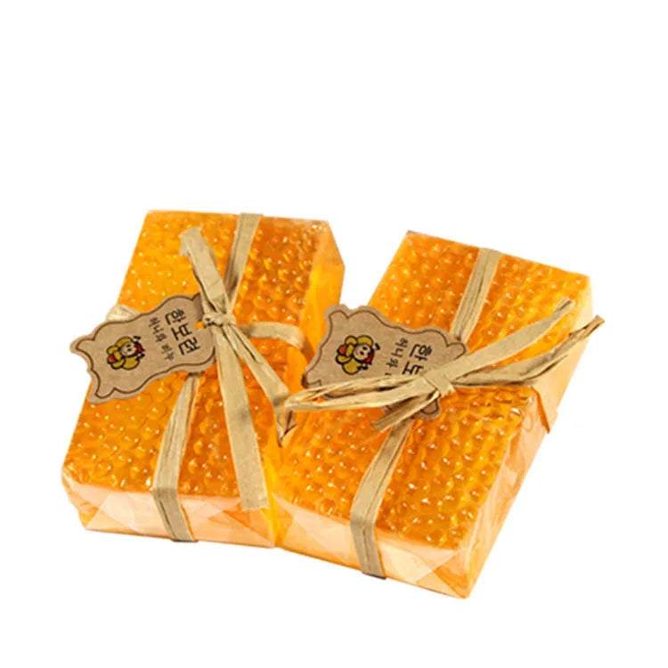 Korean propolis honey soap bar 100g yellow colour on a light background, suitable for face and body cleansing