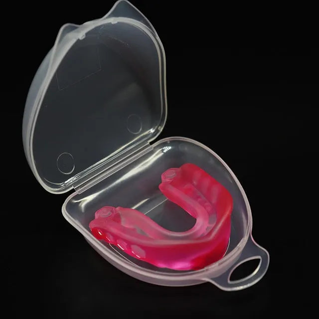 Boxing Sanda mouth guard with silicone double density, transparent lock box, and black colour option on white background