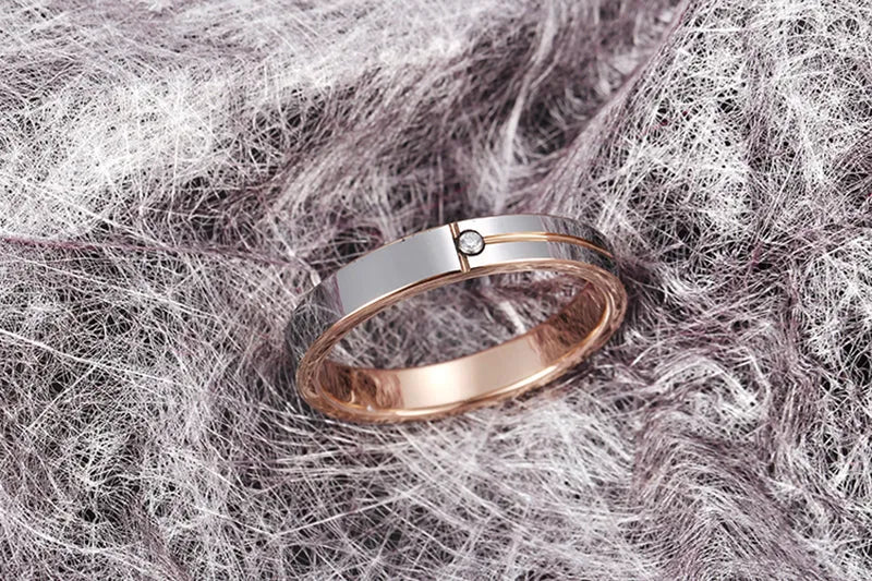 Female 4mm tungsten carbide ring with round zirconia stone, silver finish, available sizes 5-13