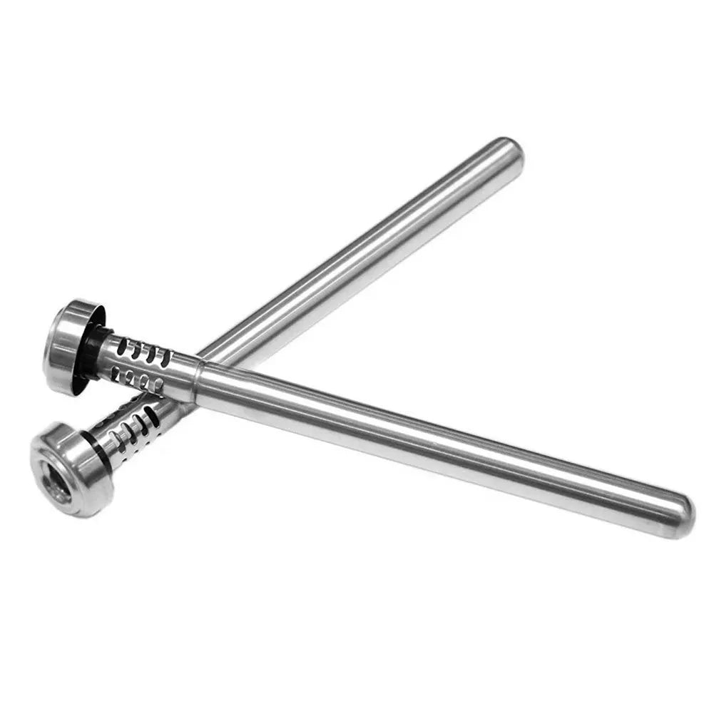 Stainless steel wine cooling rod and pourer in silver, with a bottle of red wine