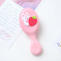 Portable resin massage comb for students, 15-20cm, in cute cartoon designs including strawberry and bunny.