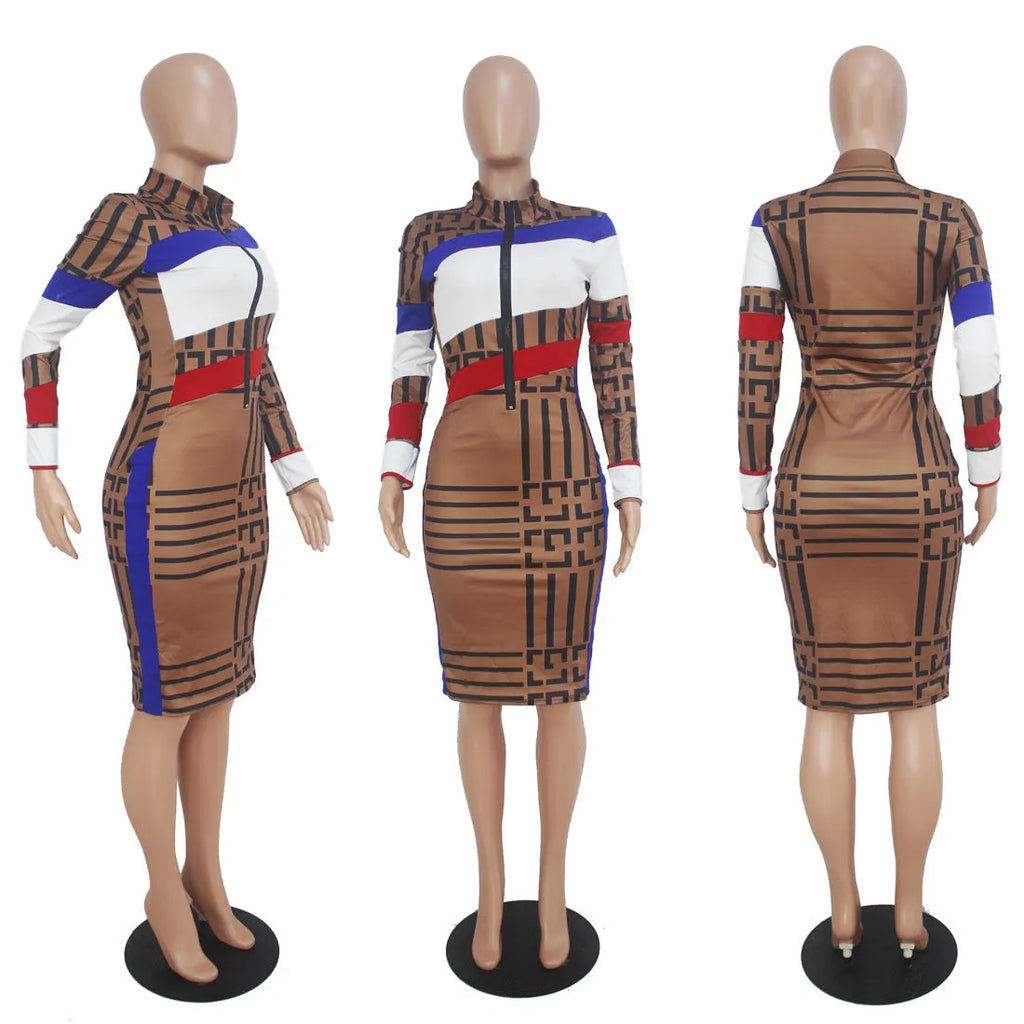 Multicolor mosaic geometry pattern long sleeve printed dress with zipper closure on a woman against a white background.
