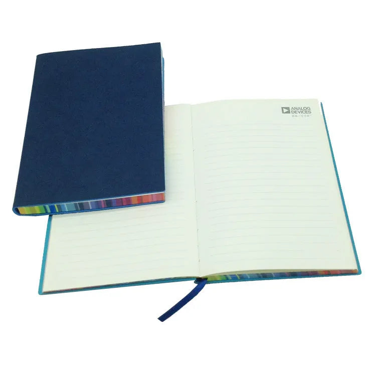Rainbow side A5 notebook with PU leather back cover and 100g Daolin paper, black colour option, on a flat surface