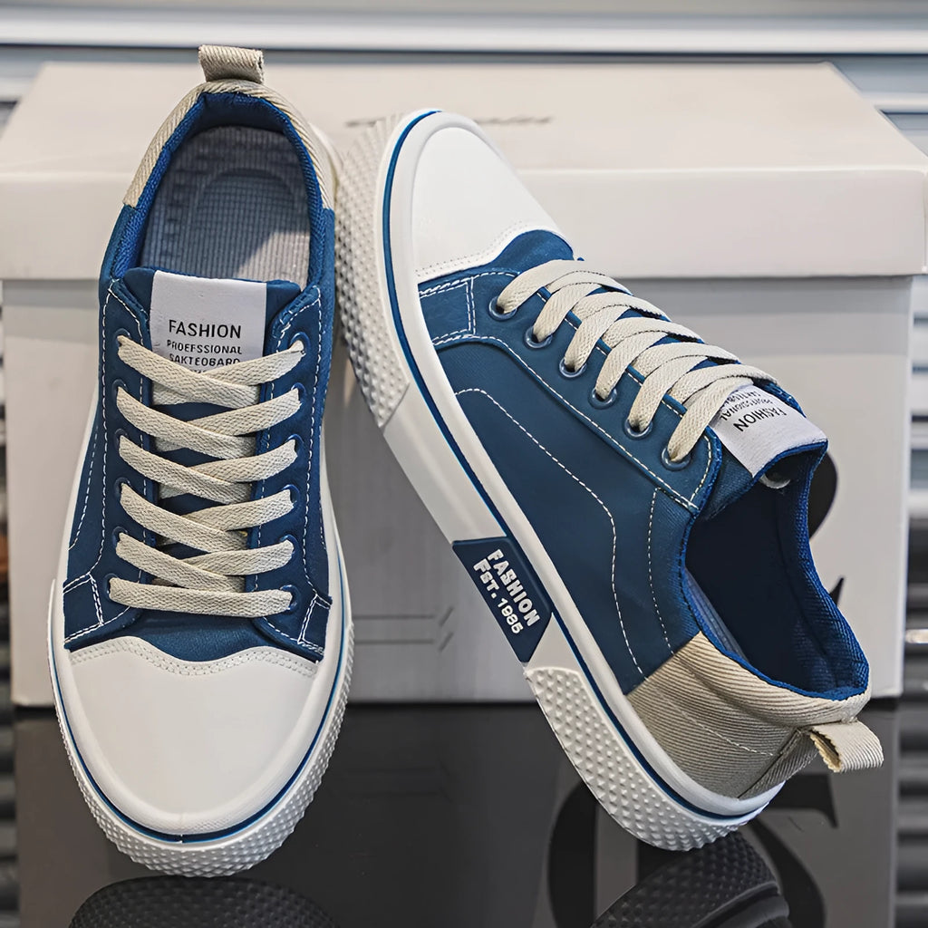 Men's low-top casual canvas shoes in blue with round toe and lace-up front for skateboarding