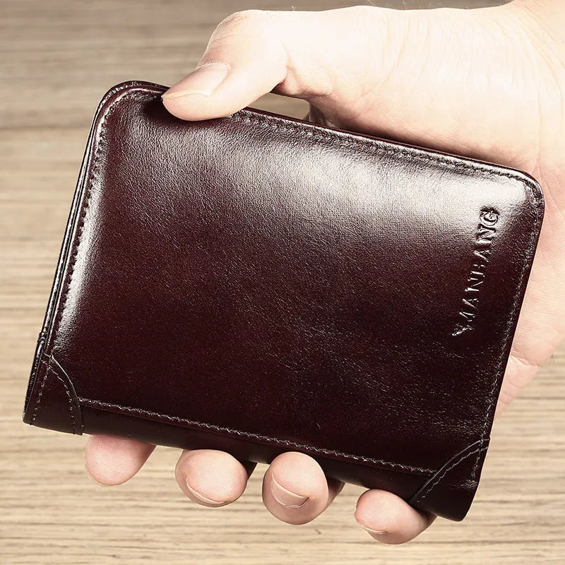 Men's black genuine leather bifold wallet open, showing eight card slots and a zipped coin compartment.