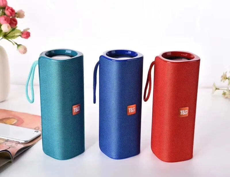 Cloth-covered wireless Bluetooth speaker with USB port and remote control
