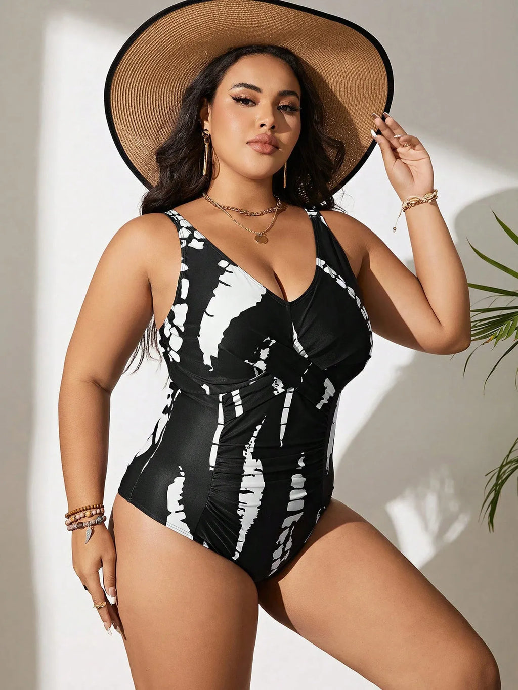 Black Siamese colour matching fit one-piece swimsuit for women on a size chart.