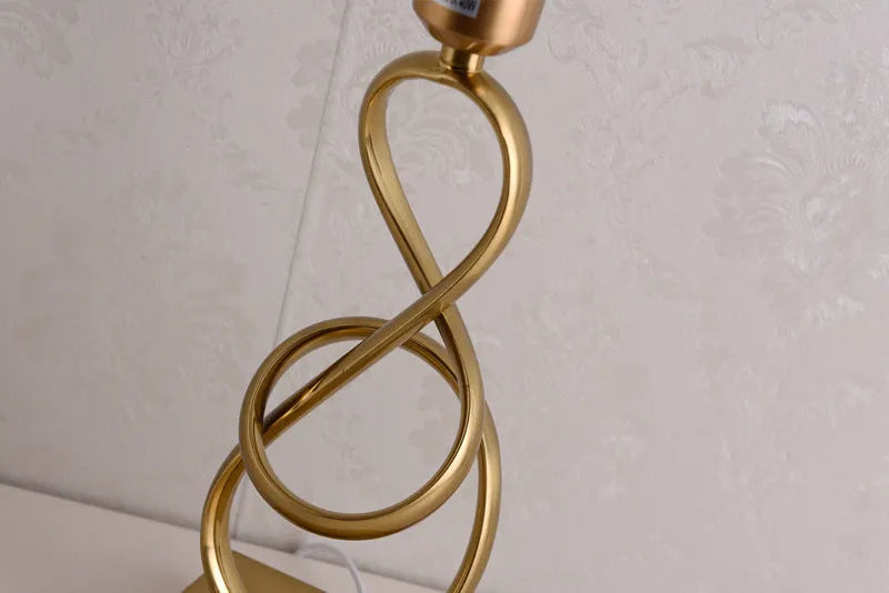 Creative bedside lamp with electroplating imitation copper finish, white colour, on a bedside table with button switch and UK plug