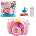 Yellow camera-shaped automatic bubble machine toy with flashing lights on green background