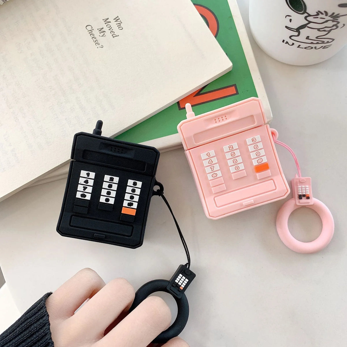 Silicone AirPods case for 1st and 2nd generation in pink or black with anti-knock cartoon cover