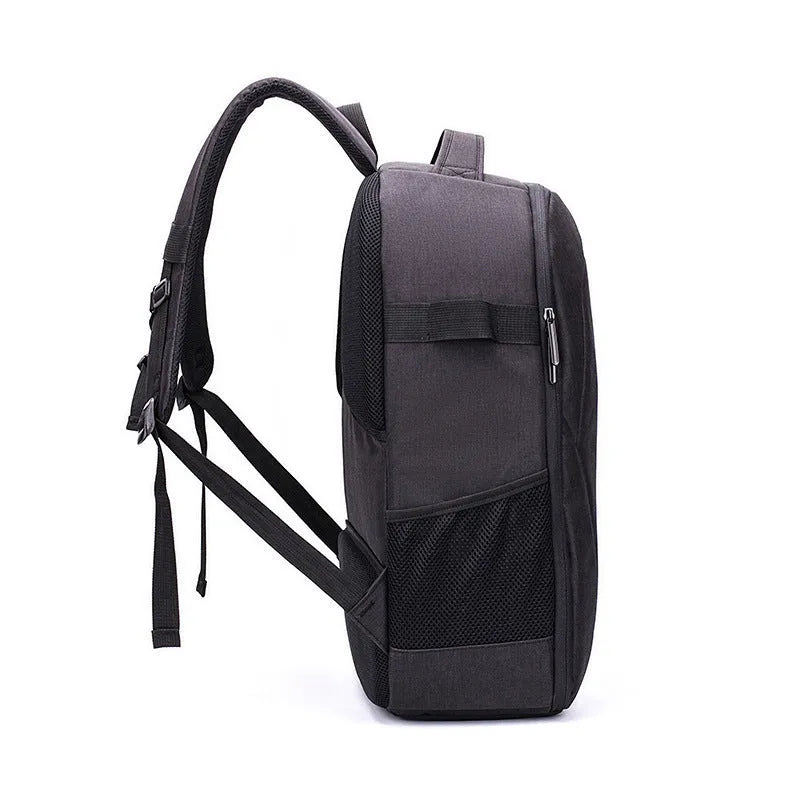 Black waterproof drone backpack with internal camera and laptop organisers showing multiple zipper compartments