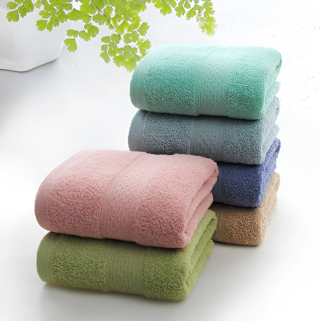 Thickened bath beach towel in seven colour options made from 80% cotton 20% polyester blend